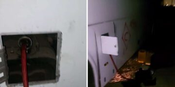 בחסות הלילה: בוזזים את האוטובוסים שנפגעו במתקפת הטילים. צילום דוברות המשטרה