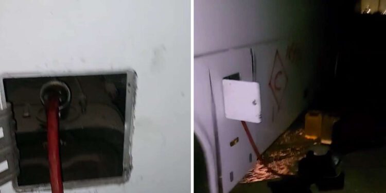 בחסות הלילה: בוזזים את האוטובוסים שנפגעו במתקפת הטילים. צילום דוברות המשטרה